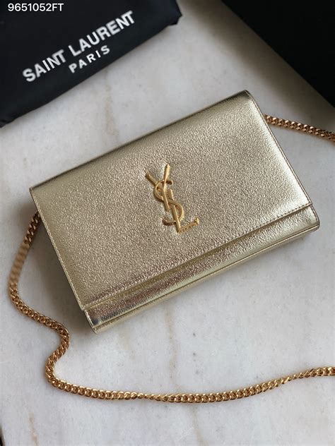 evening ysl gold clutch|SAINT LAURENT Leather Belle de Jour Clutch Gold.